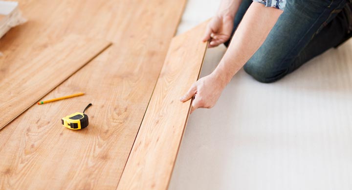 wood floor fitter installing wood flooring