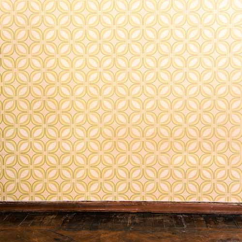 old wallpapered wall in a house blog tile