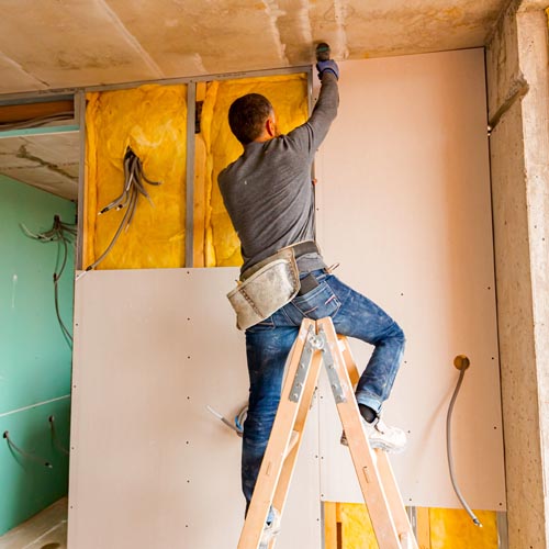 plasterboard being installed in a room blog tile